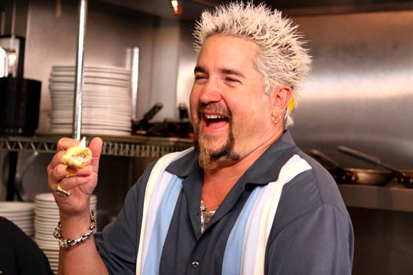 Guy Fieri of Diners, Drive-Ins and Dives on set at Colossal Cafe in Minneapolis.