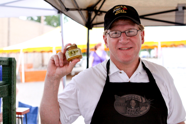 Tom Dietman holds a jar of Uncle Pete's Mustard