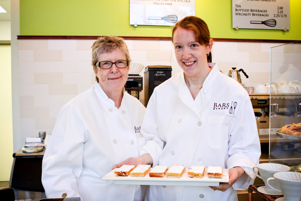 Sandi and Kara Younkin hold a tray of lemon bars in their newly opened Bars Bakery in St. Paul.
