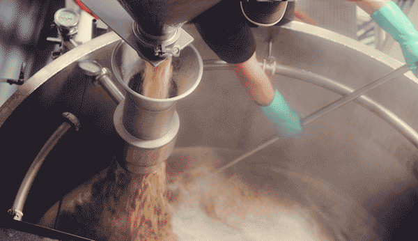 stirring the mash at Lift Bridge brewery