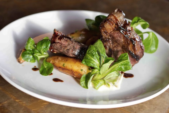 Plated lamb loin chops with fingerling potatoes. Photo: Jamie Schumacher 