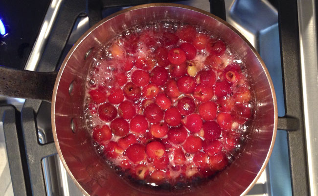 Cherry jam beginning to cook